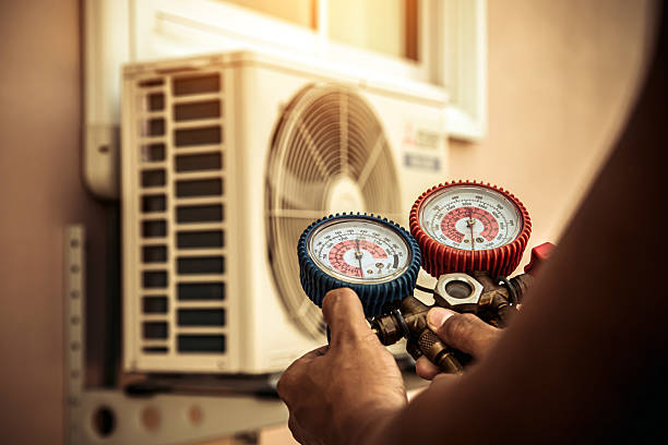 Professional Hvac technician working in Toone, TN